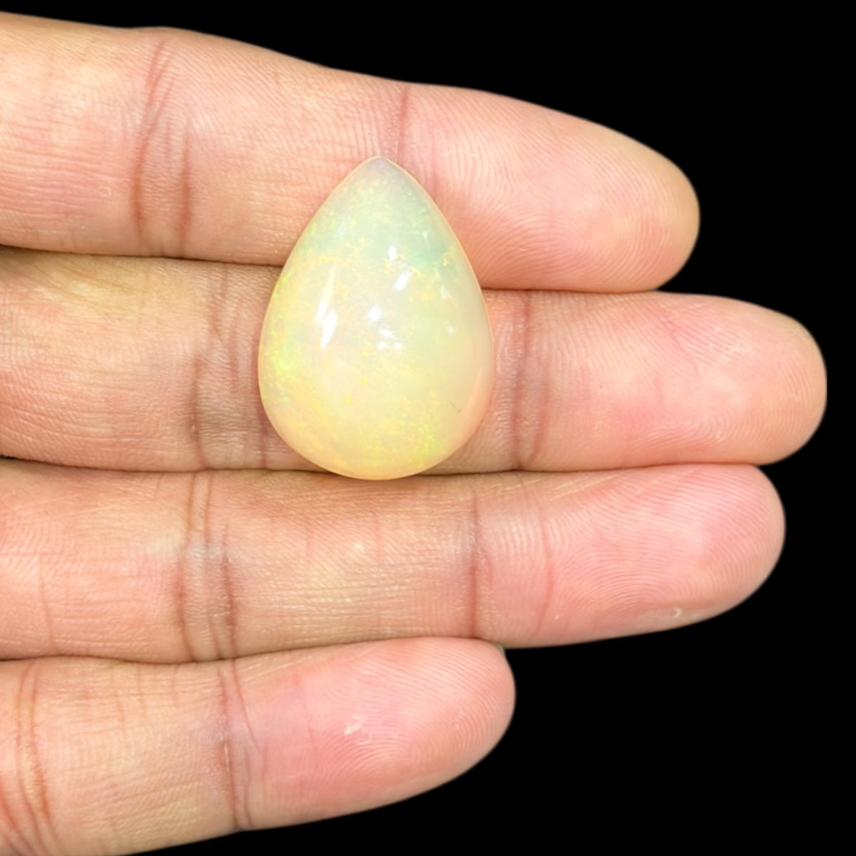 Natural LightYellow Ethiopian Opal Stone 23.76 Carats Pear Cabochon Shape 27.6 x 20.1 x 11.8 mm