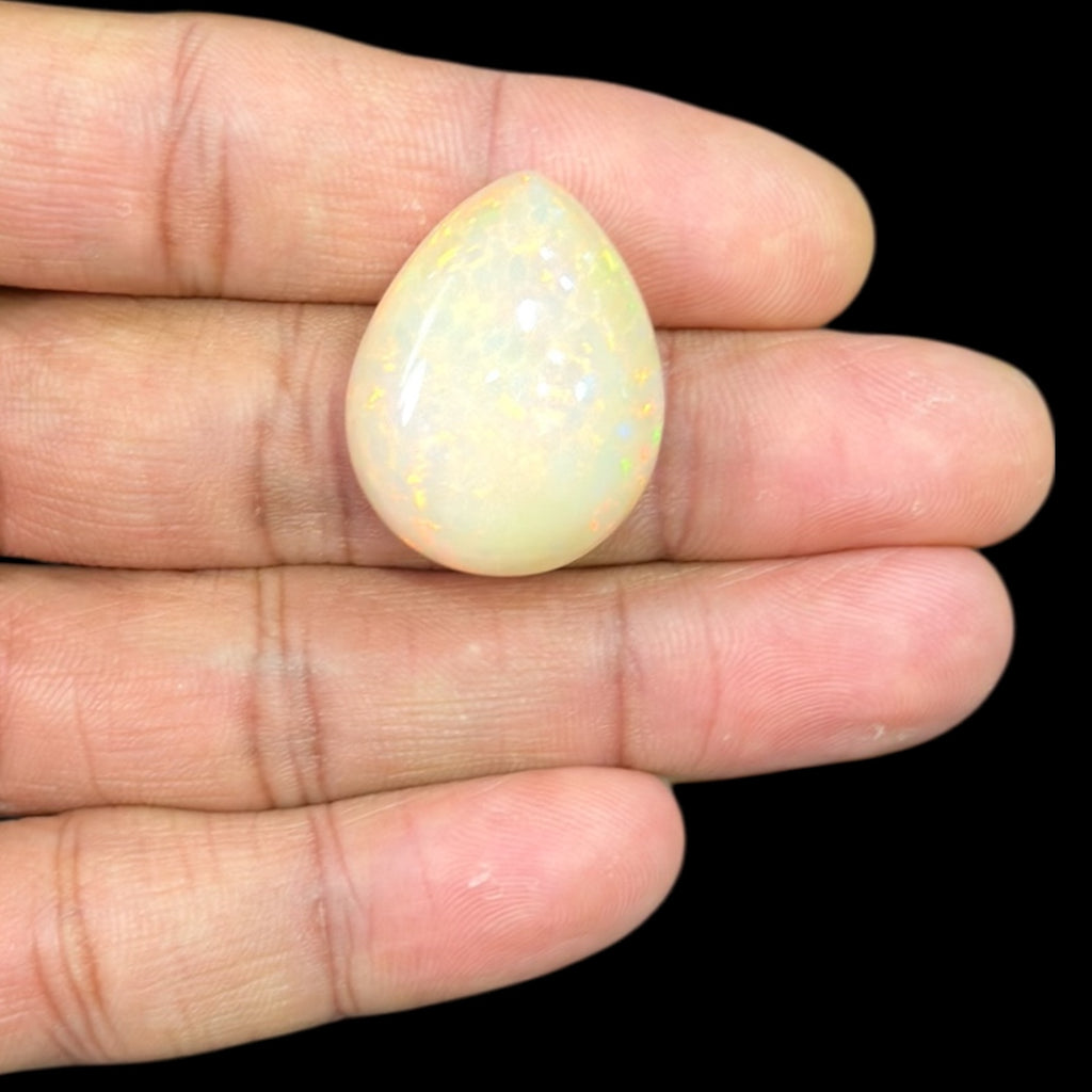 Natural LightYellow Ethiopian Opal Stone 31.79 Carats Pear Cabochon Shape 27.2 x 21.5 x 11.5 mm