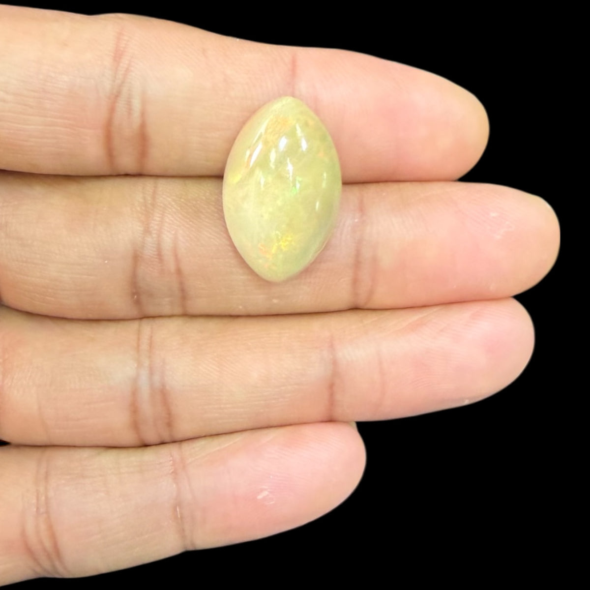Natural PaleGoldenrod Color Ethiopian Opal Stone 13.89 Carats Marquise Cabochon Shape 22.6 x 14.3 x 8.7 mm