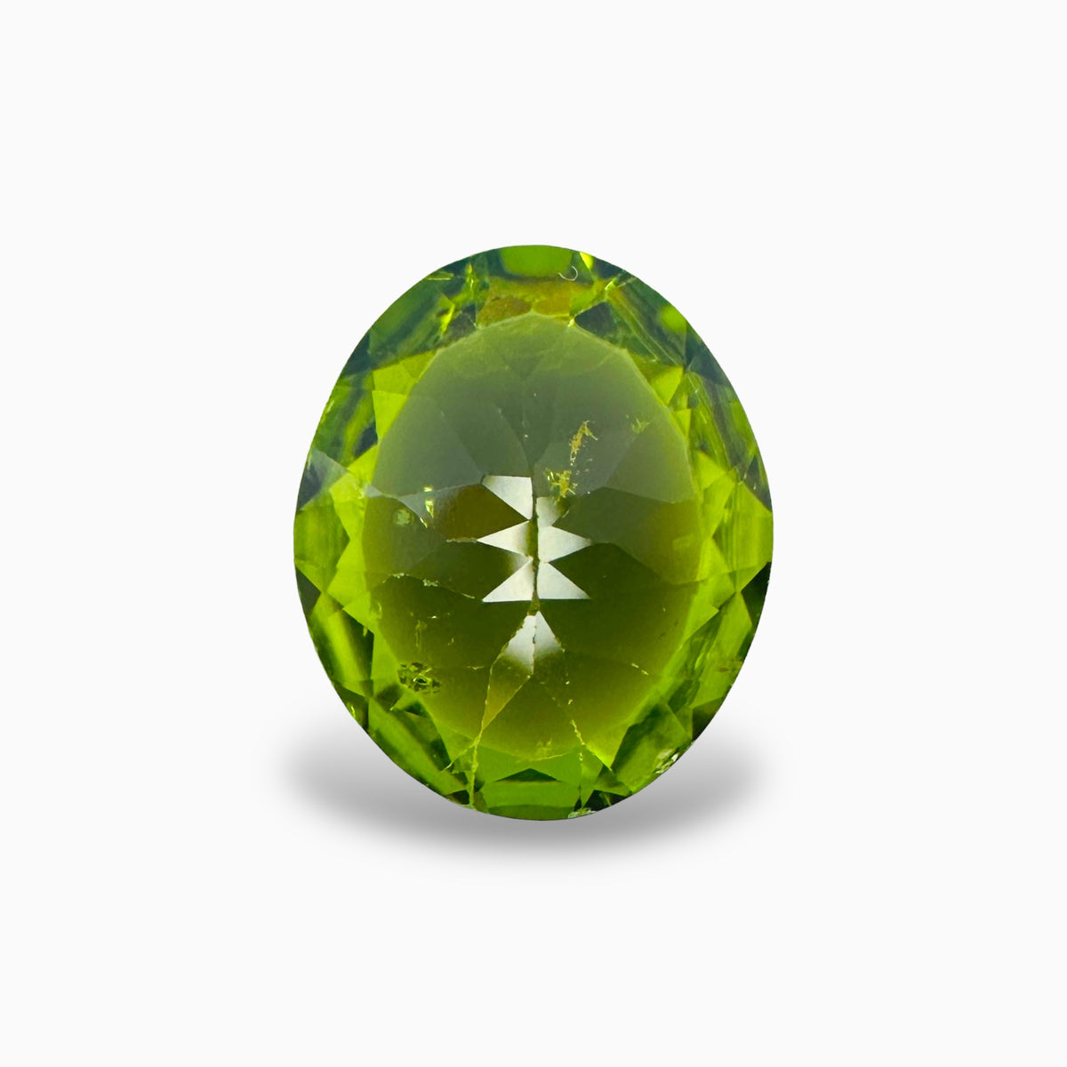 Natural Peridot Oval Cut 4.72 Carats, 10x12 mm Buy Online
