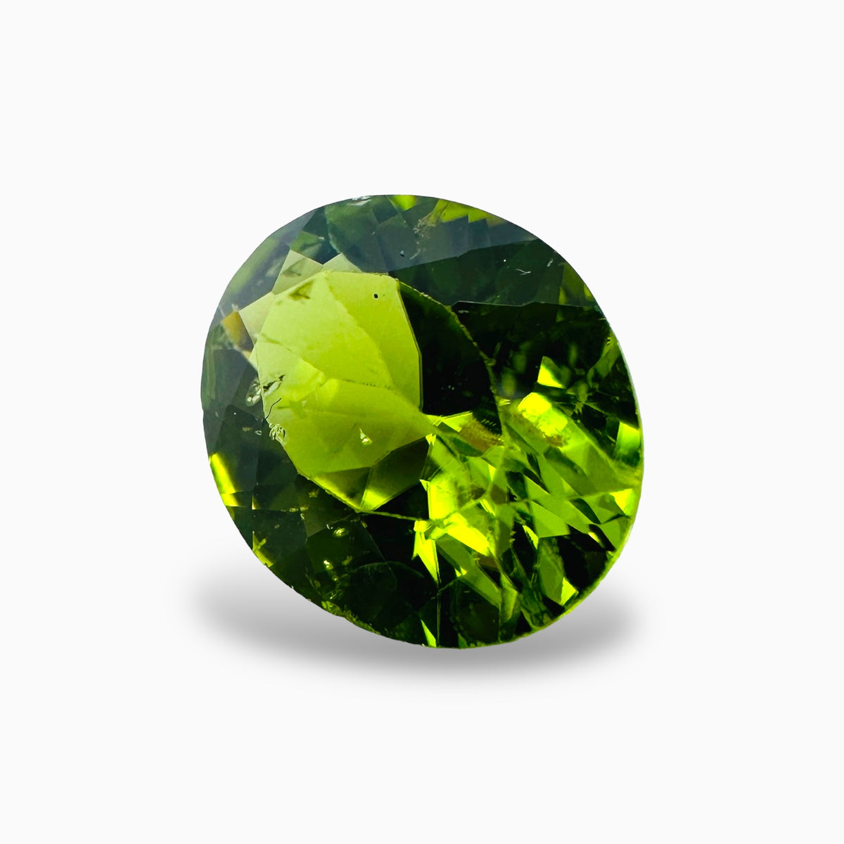 Natural Peridot Oval Cut 4.72 Carats, 10x12 mm Buy Online