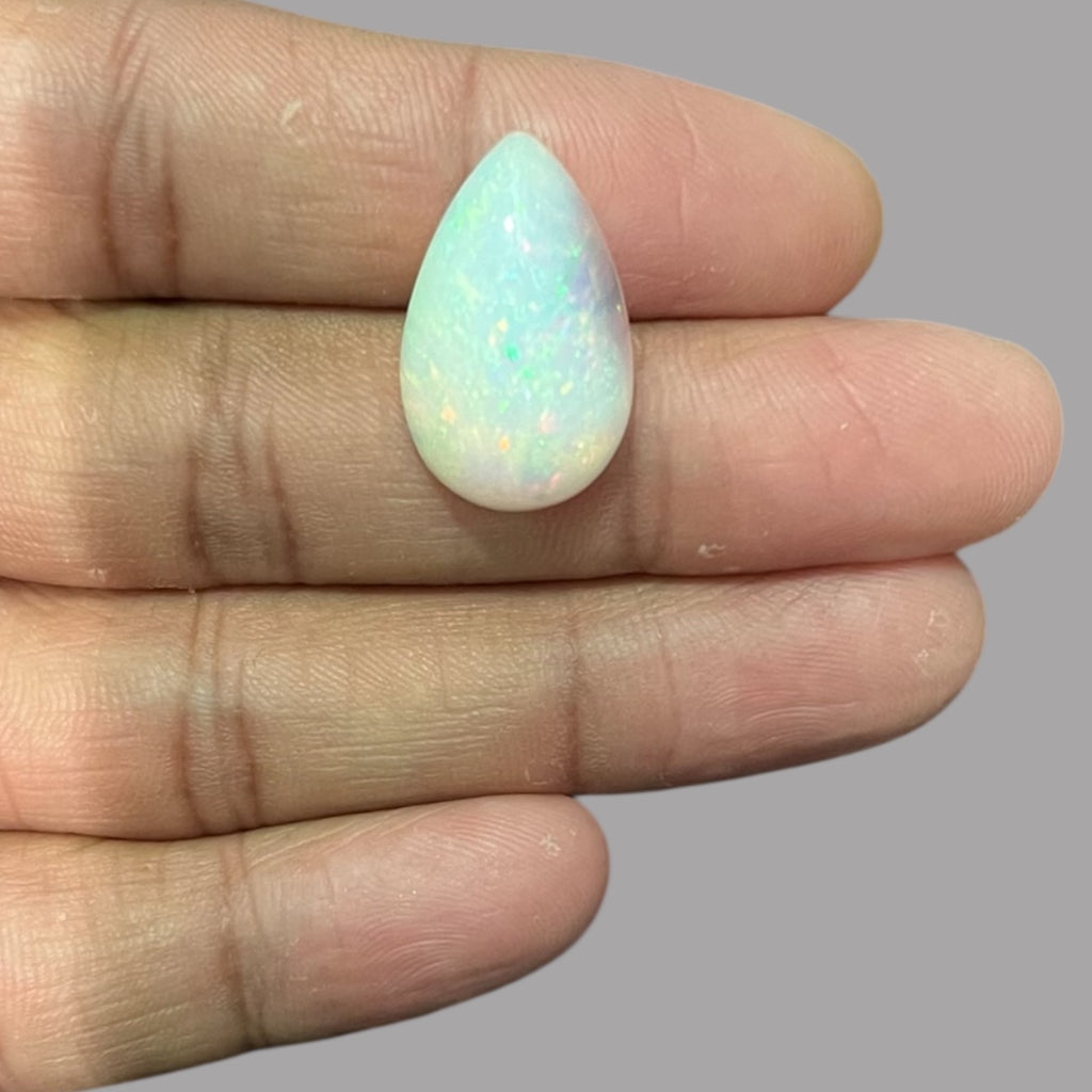 Natural White Color Ethiopian Opal Stone 12.17 Carats Pear Cabochon Shape 23.2 x 14.5 x 7.3 mm