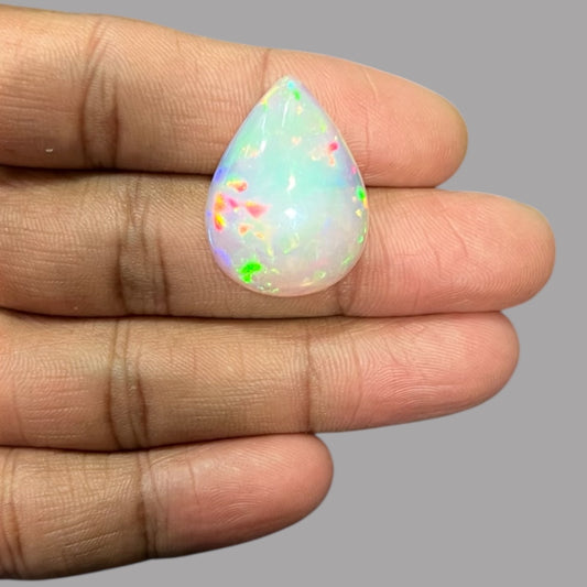 Natural White Color Ethiopian Opal Stone 12.74 Carats Pear Cabochon Shape 27.3 x 20.3 x 6.4 mm