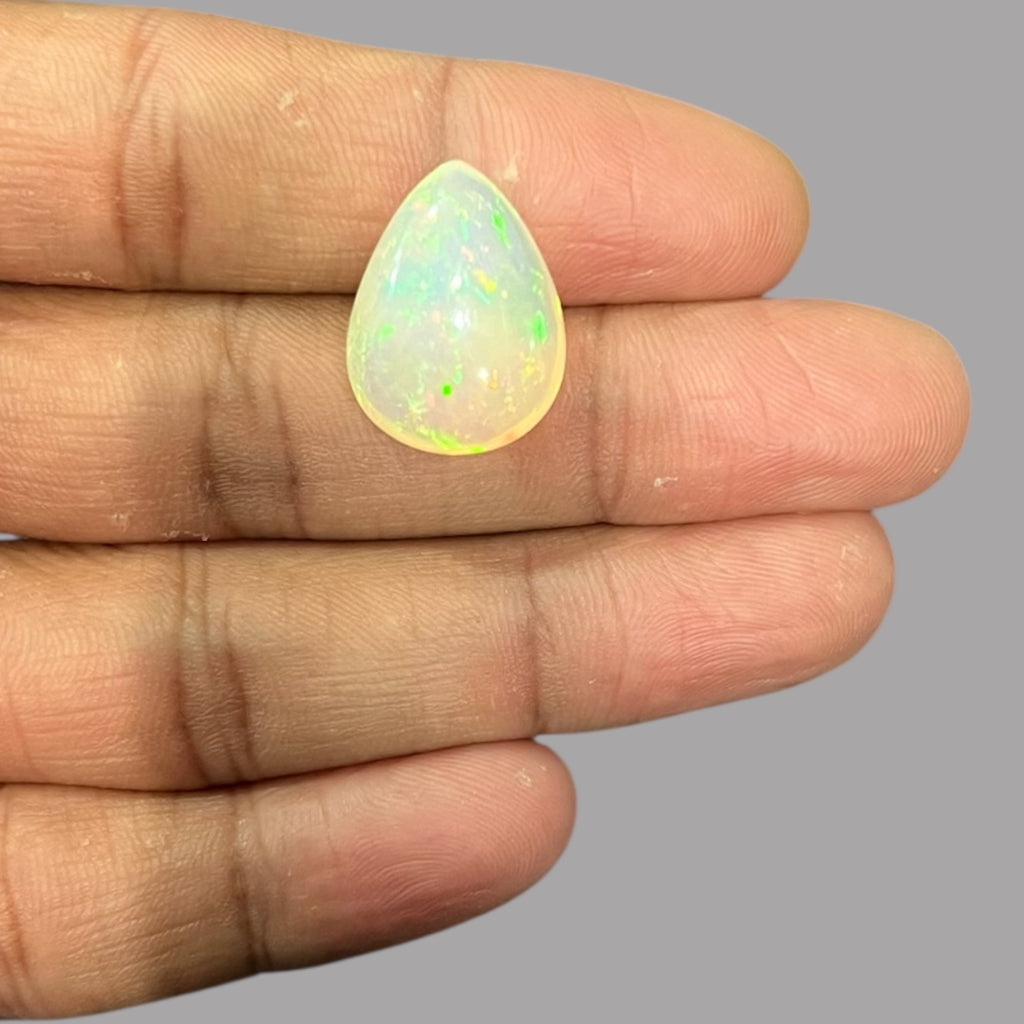 Natural White Color Ethiopian Opal Stone 12.88 Carats Pear Cabochon Shape 20.1 x 15.1 x 9.7 mm