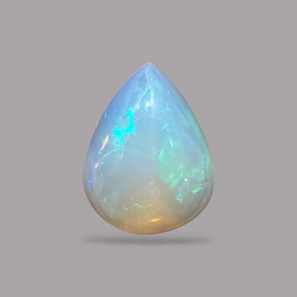Natural White Color Ethiopian Opal Stone 13.18 Carats Pear Cabochon Shape 20.5 x 15.5 x 9.8 mm