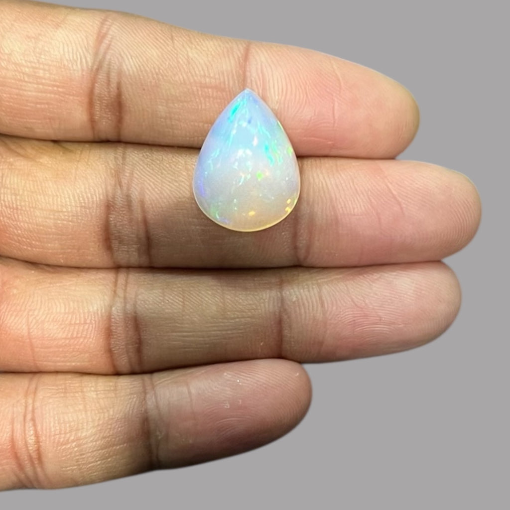 Natural White Color Ethiopian Opal Stone 13.18 Carats Pear Cabochon Shape 20.5 x 15.5 x 9.8 mm