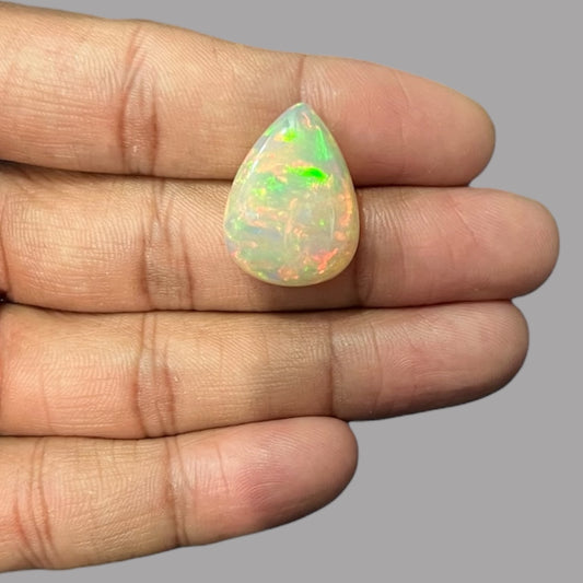 Natural White Color Ethiopian Opal Stone 13.61 Carats Pear Cabochon Shape 23.4 x 17.5 x 7.2 mm