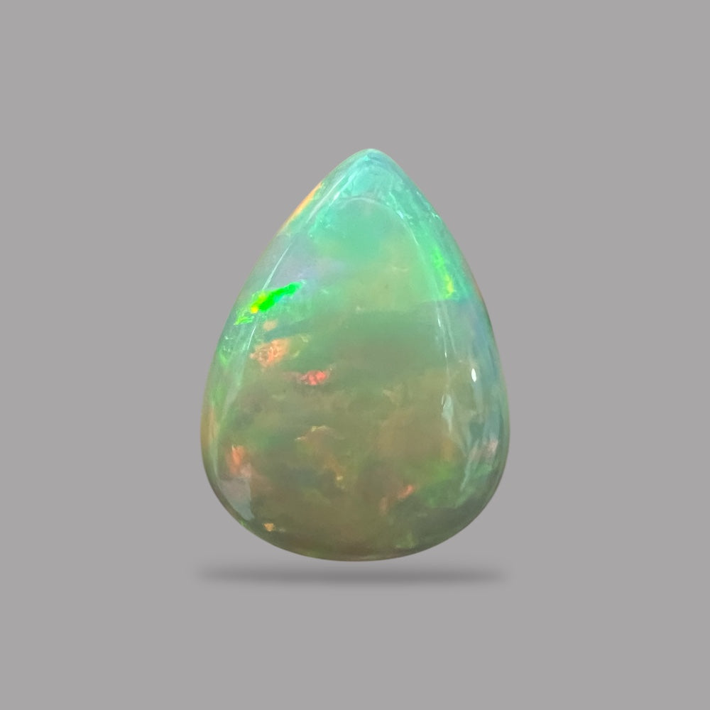 Natural White Color Ethiopian Opal Stone 13.61 Carats Pear Cabochon Shape 23.4 x 17.5 x 7.2 mm
