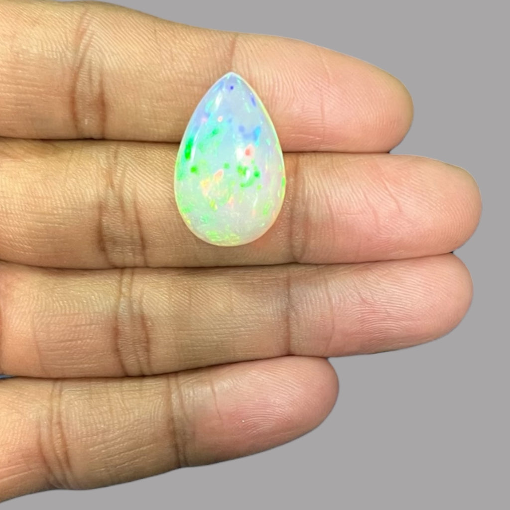 Natural White Color Ethiopian Opal Stone 14.45 Carats Pear Cabochon Shape 24.2 x 15.6 x 8.5 mm