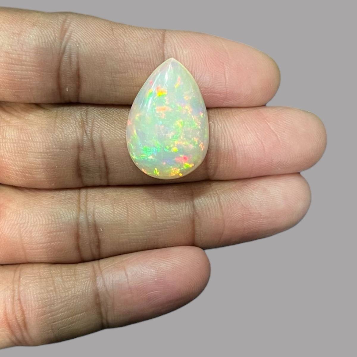 Natural White Color Ethiopian Opal Stone 15.37 Carats Pear Cabochon Shape 25.7 x 17.6 x 8.4 mm