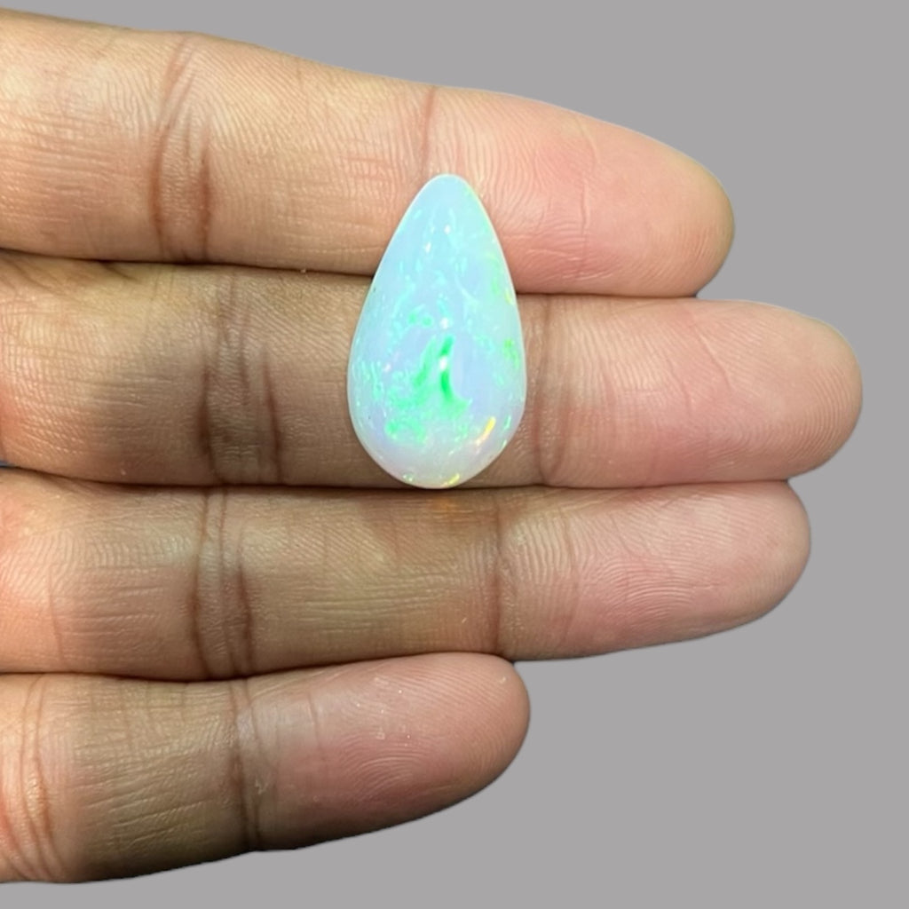 Natural White Color Ethiopian Opal Stone 16.47 Carats Pear Cabochon Shape 25.7 x 14.6 x 8.7 mm