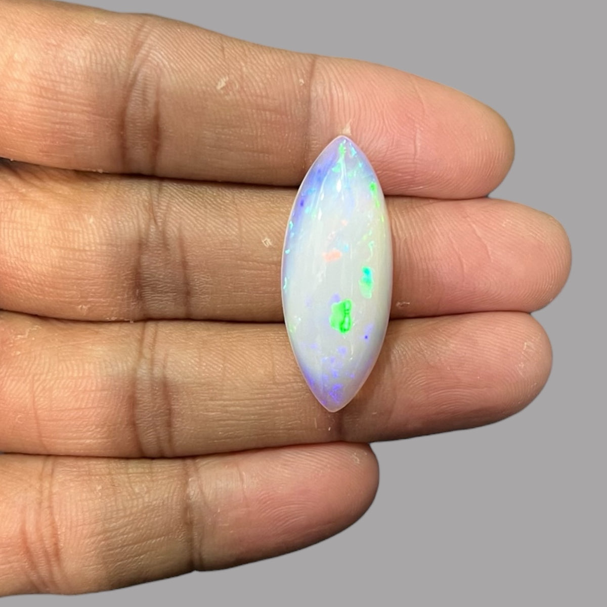 Natural White Color Ethiopian Opal Stone 18.73 Carats Marquise Cabochon Shape 33.5 x 13.6 x 8.3 mm