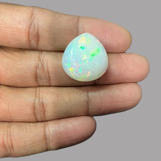 Natural White Color Ethiopian Opal Stone 19.29 Carats Pear Cabochon Shape 22.4 x 21.3 x 9.1 mm