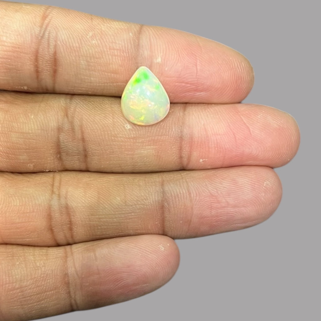 Natural White Color Ethiopian Opal Stone 2.88 Carats Pear Cabochon Shape 13 x 10.9 x 4.7 mm