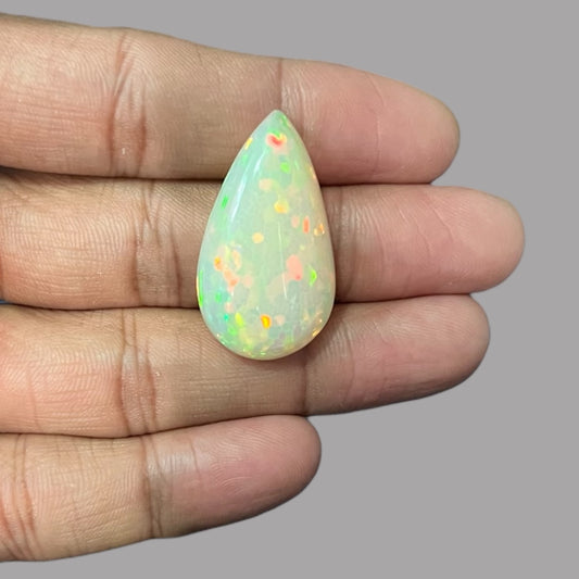 Natural White Color Ethiopian Opal Stone 21.16 Carats Pear Cabochon Shape 33.5 x 8.9 x 7.1 mm