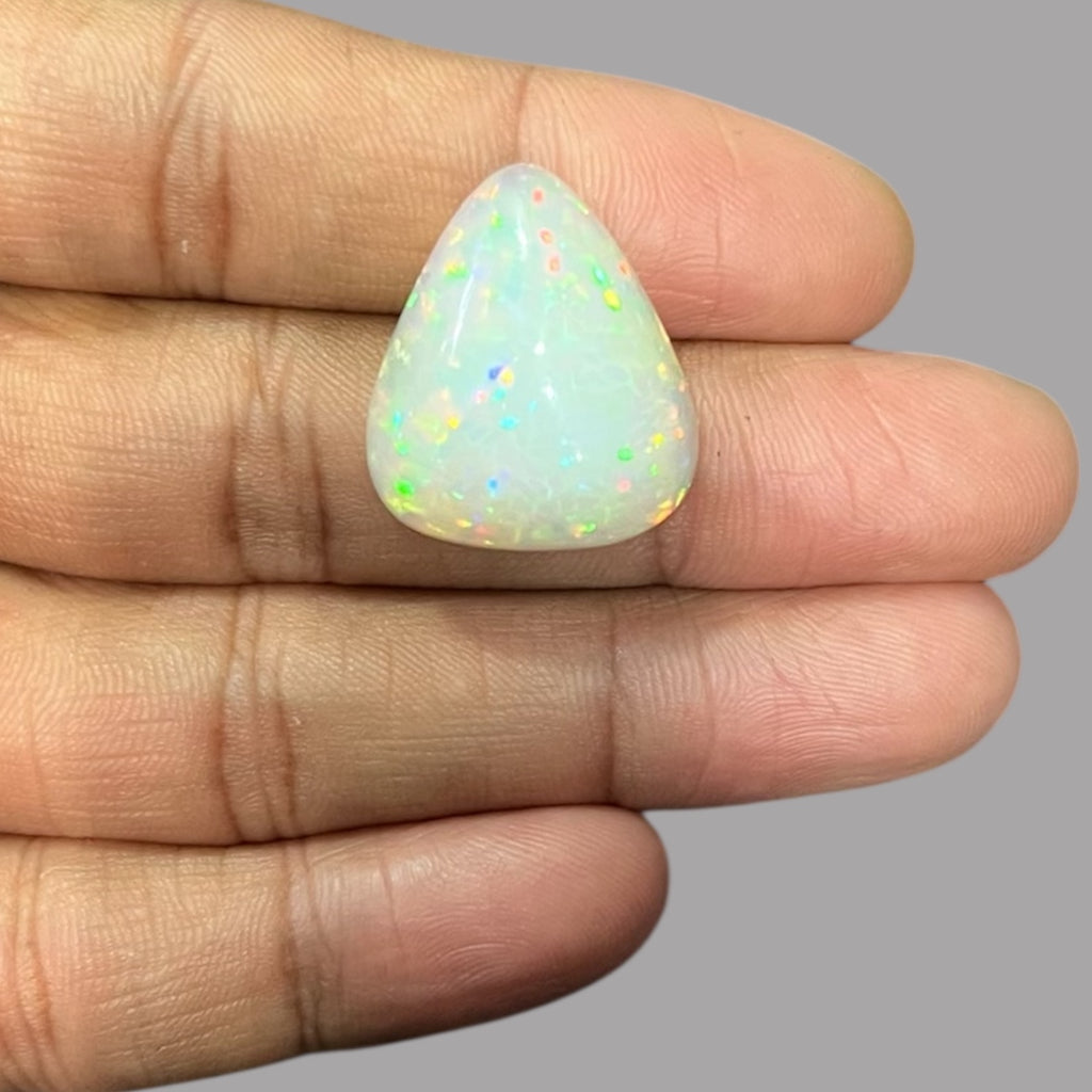 Natural White Color Ethiopian Opal Stone 21.33 Carats Pear Cabochon Shape 24.4 x 21 x 8.5 mm
