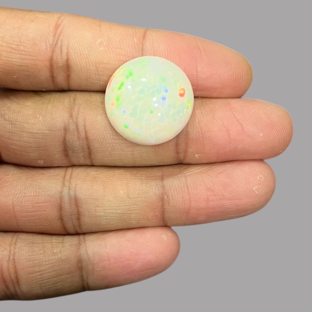 Natural White Color Ethiopian Opal Stone 25.12 Carats Round Cabochon Shape 21 x 11.5 mm