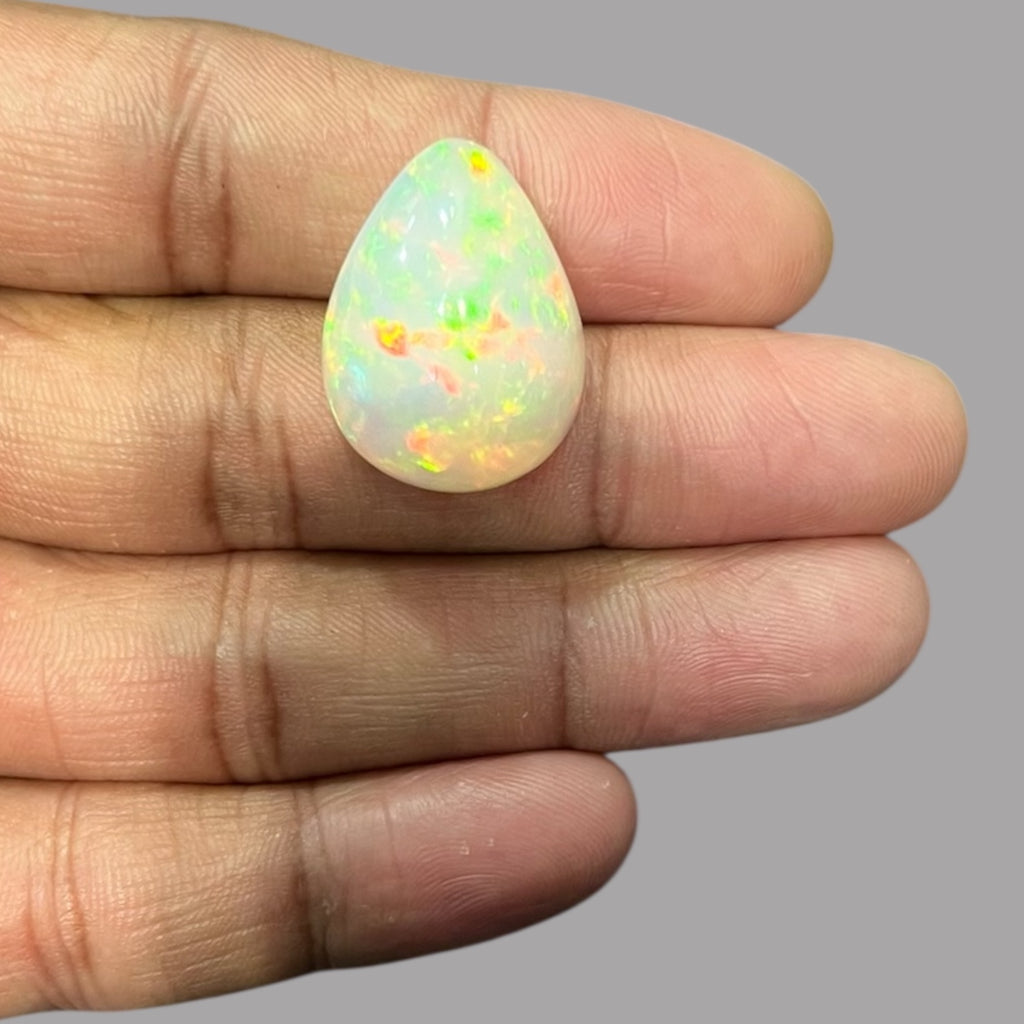 Natural White Color Ethiopian Opal Stone 25.72 Carats Pear Cabochon Shape 24.3 x 18.7 x 11.5