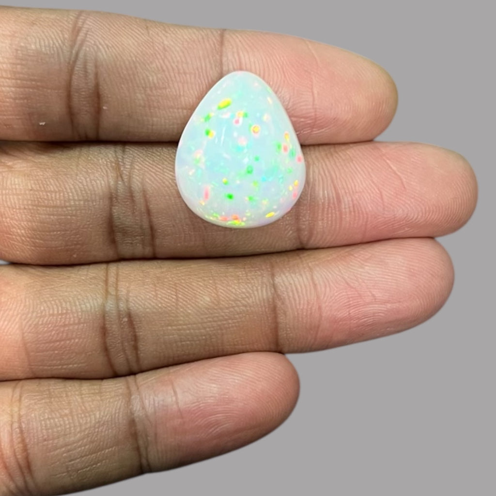 Natural White Color Ethiopian Opal Stone 26.05 Carats Pear Cabochon Shape 22.6 x 18.8 x 12 mm