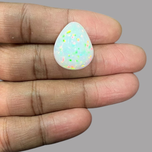 Natural White Color Ethiopian Opal Stone 26.05 Carats Pear Cabochon Shape 22.6 x 18.8 x 12 mm