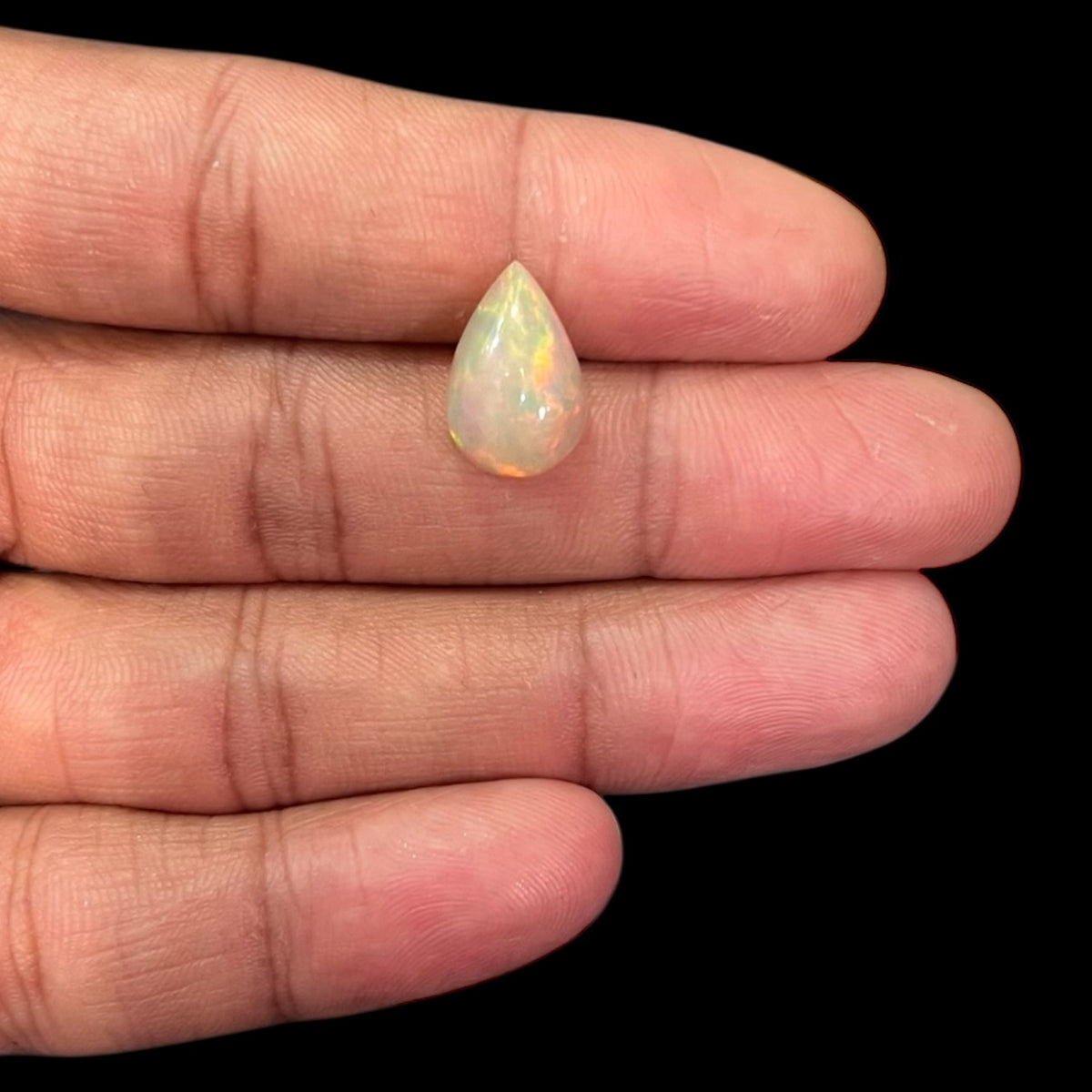 Natural White Color Ethiopian Opal Stone 4.31 Carats Pear Cabochon Shape 15.1 x 10 x 6.4 mm
