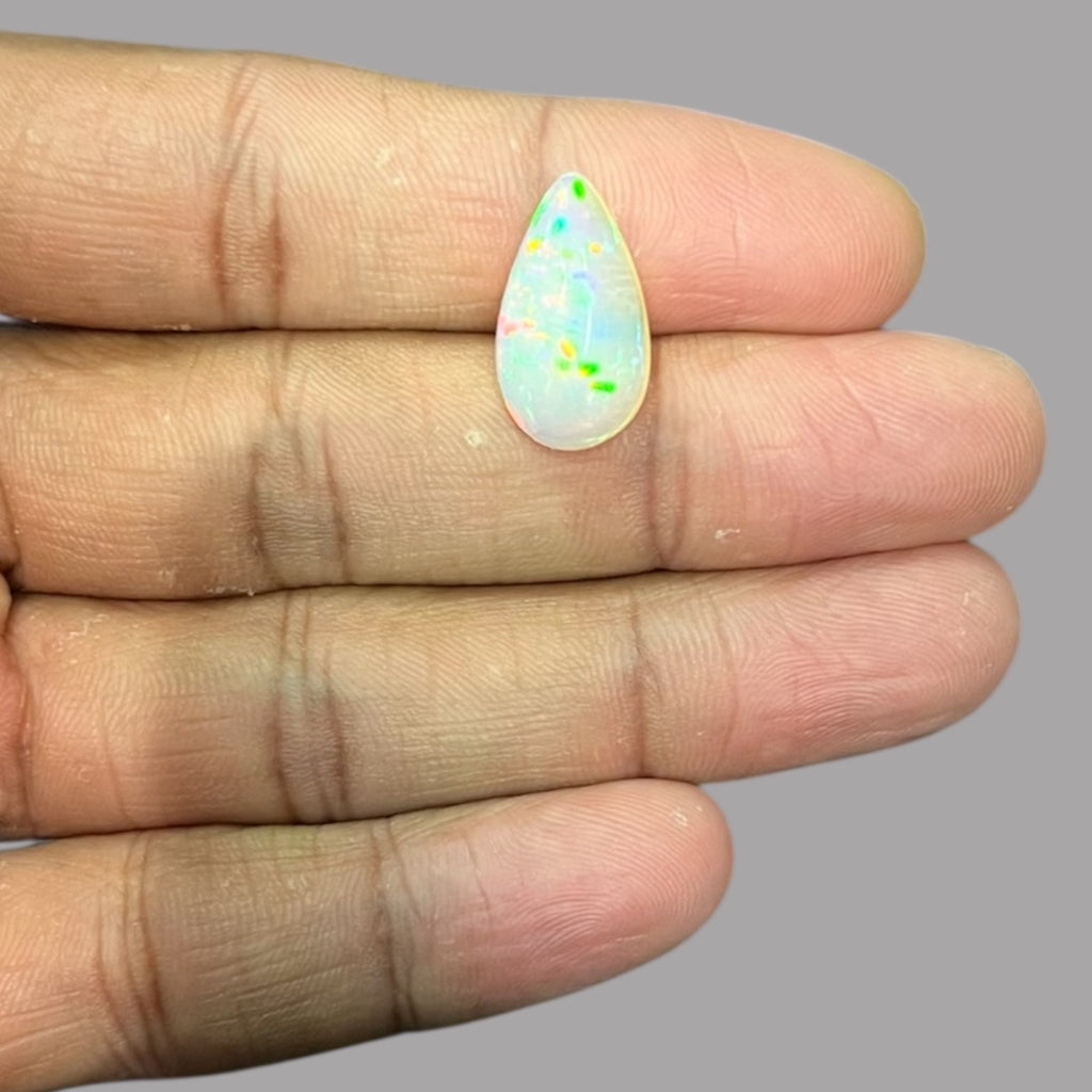Natural White Color Ethiopian Opal Stone 4.63 Carats Pear Cabochon Shape 18.8 x 10.6 x 5.2 mm
