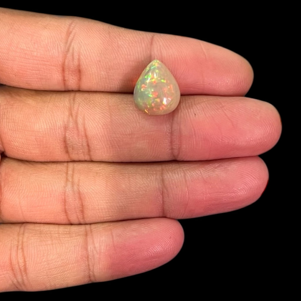 Natural White Color Ethiopian Opal Stone 4.81 Carats Pear Cabochon Shape 14.1 x 11.9 x 6.5 mm