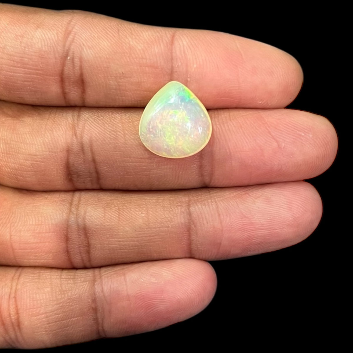  Natural White Color Ethiopian Opal Stone 5.46 Carats Pear Cabochon Shape 15.6 x 14.7 x 5.4 mm