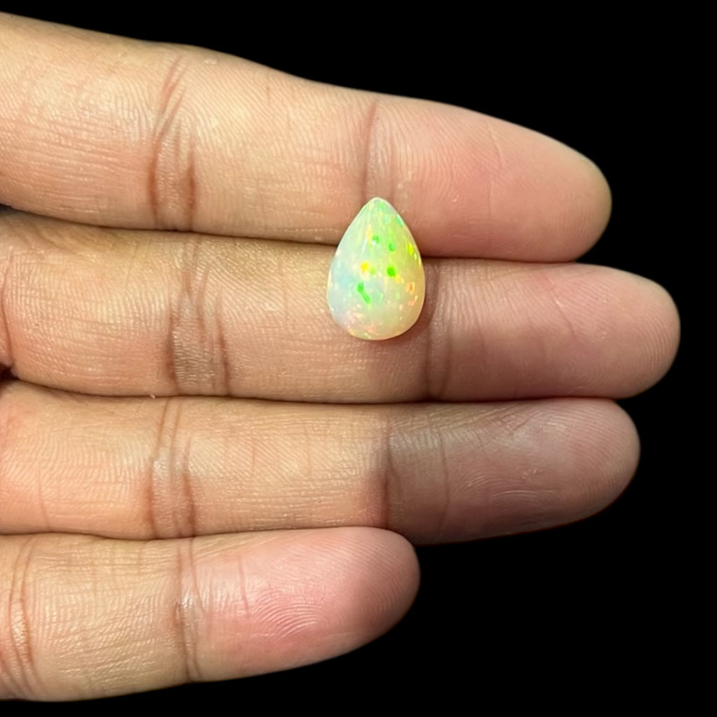 Natural White Color Ethiopian Opal Stone 5.48 Carats Pear Cabochon Shape 15 x 10.5 x 7.9 mm