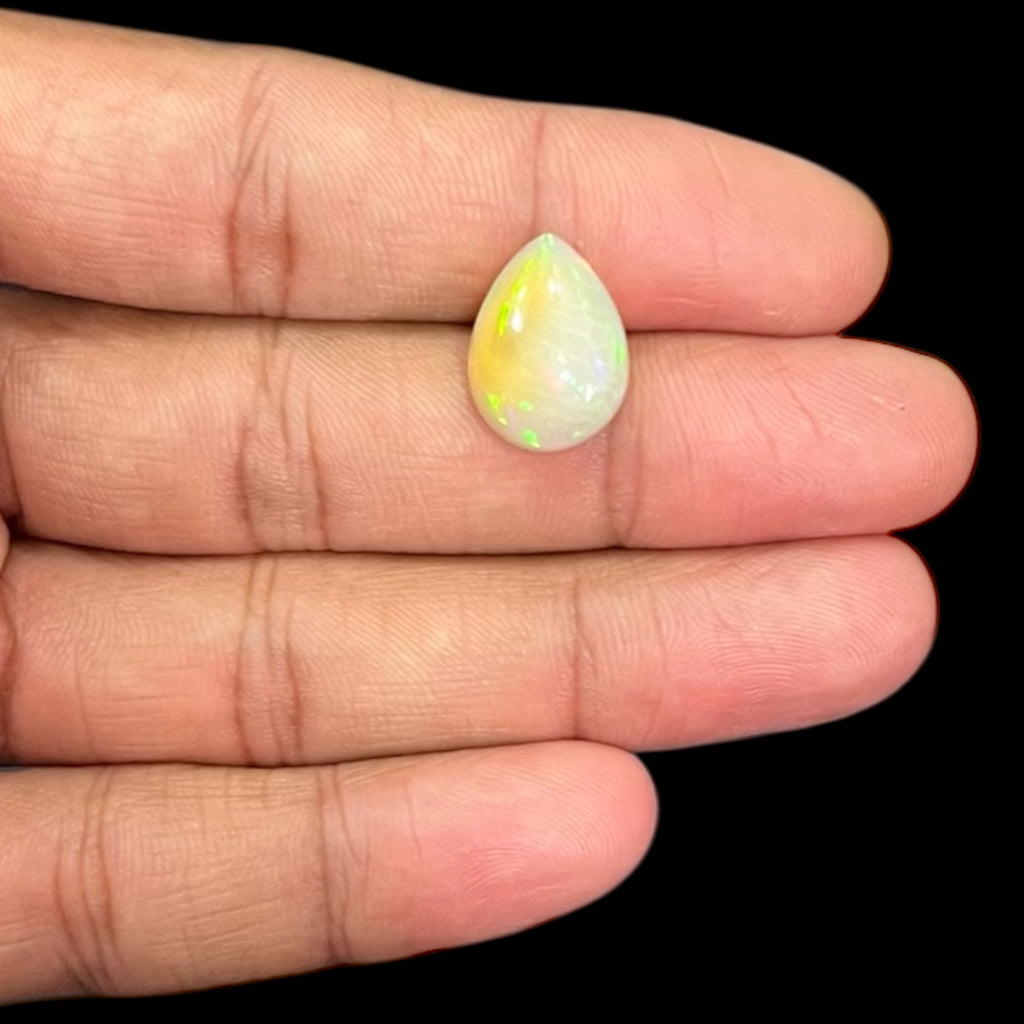 Natural White Color Ethiopian Opal Stone 5.93 Carats Pear Cabochon Shape 16.1 x 12 x 6 mm