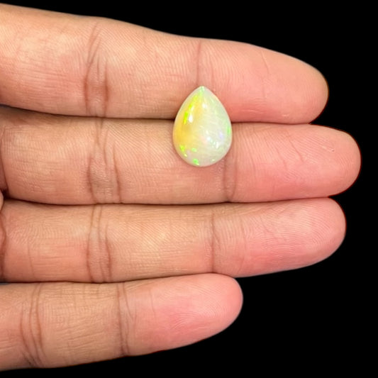 Natural White Color Ethiopian Opal Stone 5.93 Carats Pear Cabochon Shape 16.1 x 12 x 6 mm