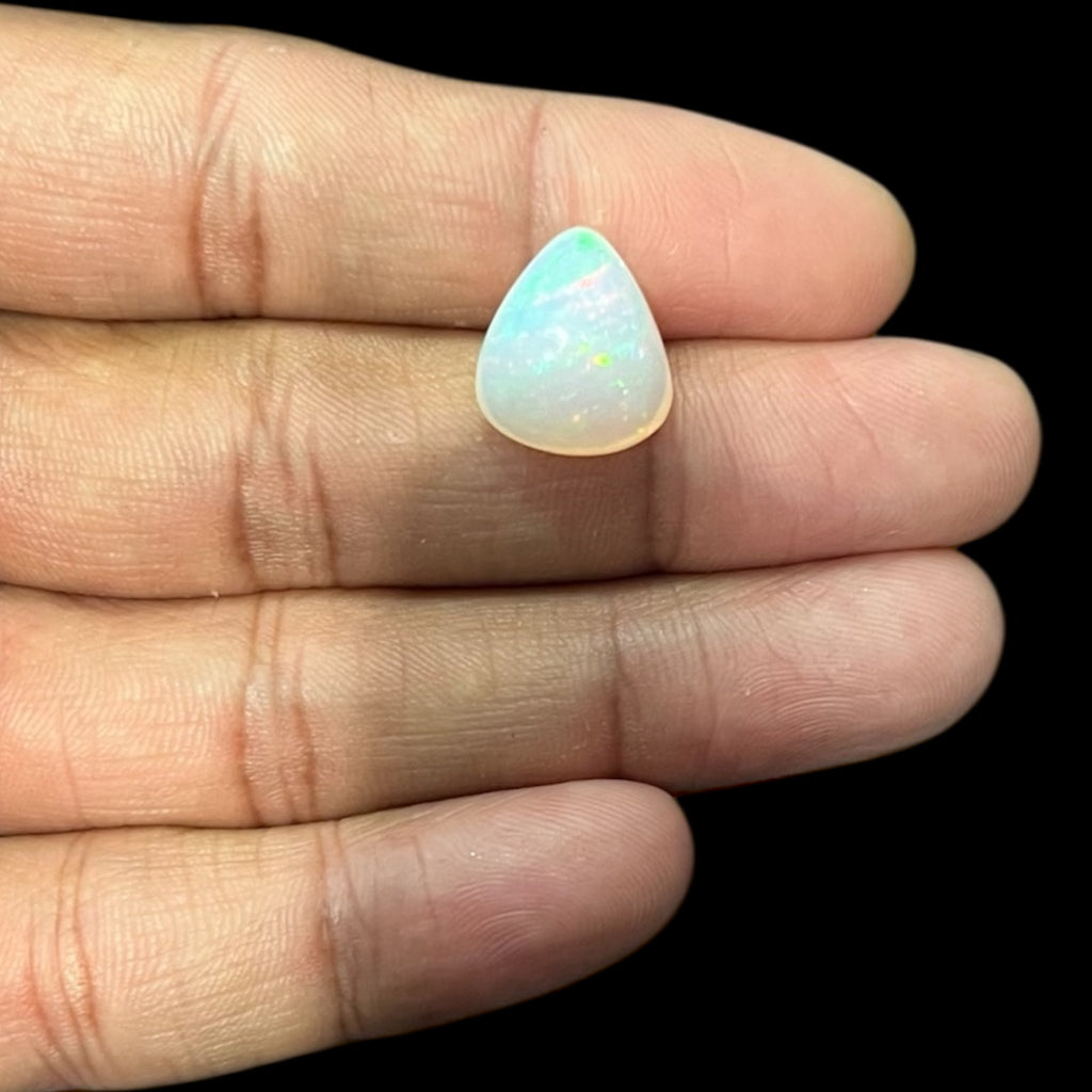 Natural White Color Ethiopian Opal Stone 5.95 Carats Pear Cabochon Shape 15 x 13.2 x 7.7 mm