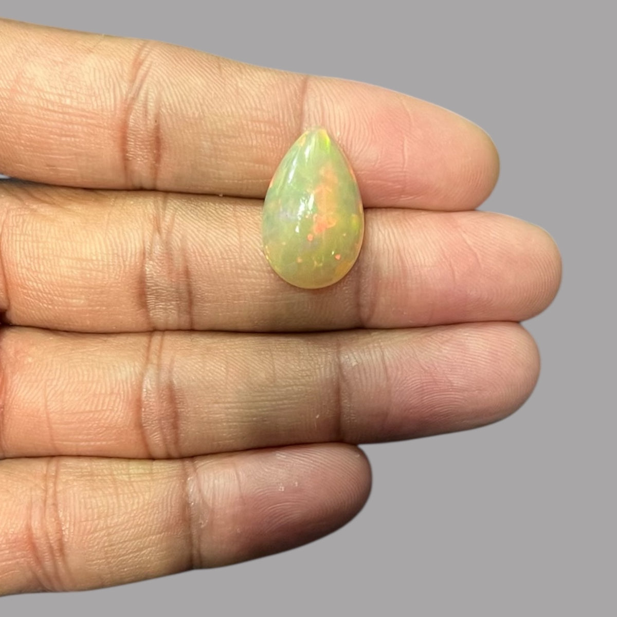 Natural White Color Ethiopian Opal Stone 6.79 Carats Pear Cabochon Shape 20.7 x 13.1 x 6.7 mm