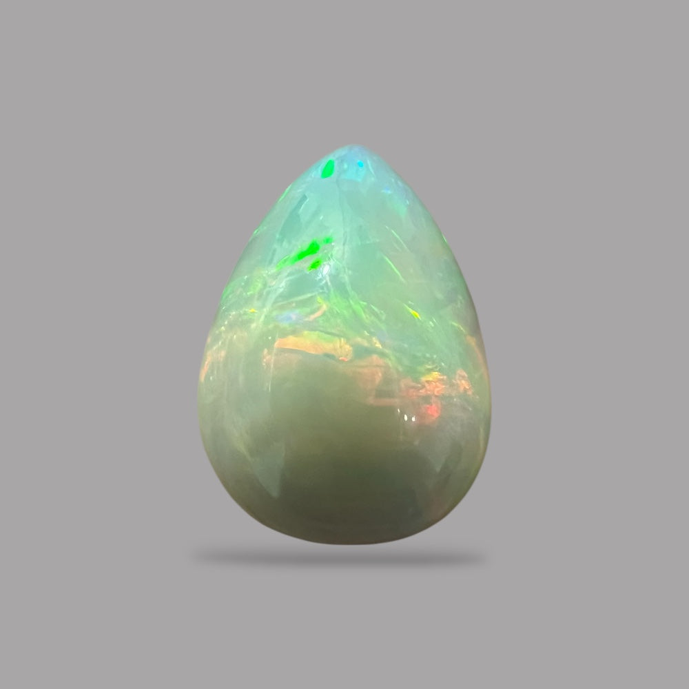 Natural White Color Ethiopian Opal Stone 8.08 Carats Pear Cabochon Shape 19.1 x 14 x 7.7 mm
