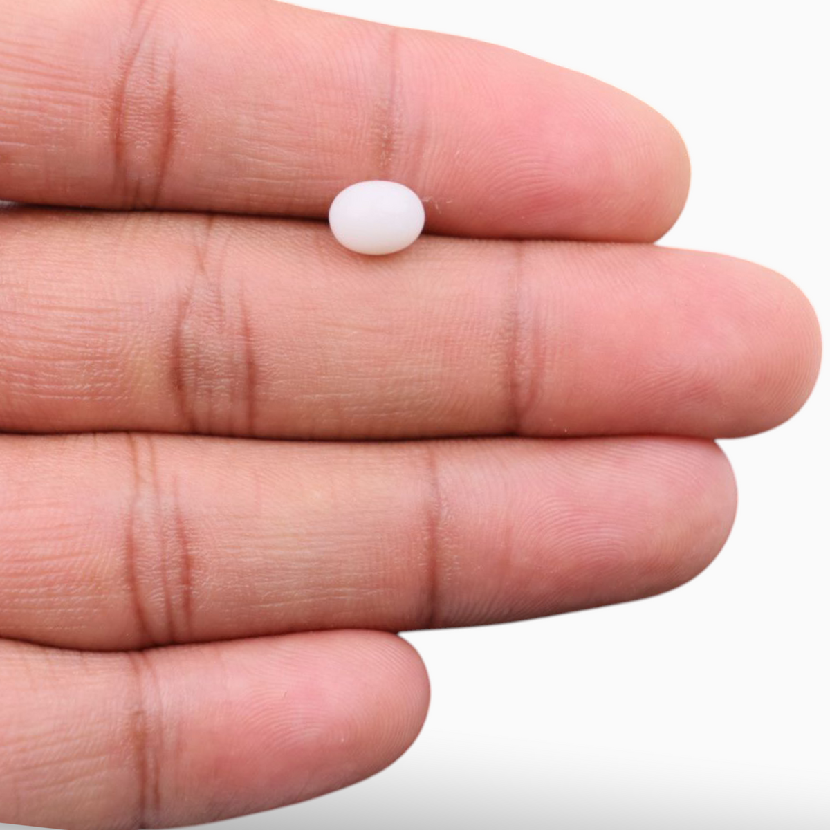 White Coral Stone For Sale 1.71 Carats In Oval Cabochon Shape 8x6mm Size