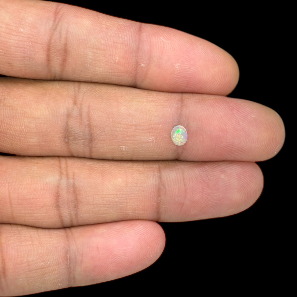 Natural White Ethiopian Opal Stone 0.28 Carats Oval Cabochon Shape 5 x 4 mm