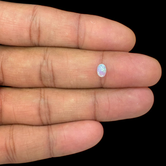 Natural White Ethiopian Opal Stone 0.32 Carats Oval Cabochon Shape 6.1 x 4.3 mm