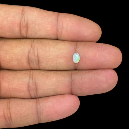 Natural White Ethiopian Opal Stone 0.35 Carats Oval Cabochon Shape 6.2 x 4.1 mm