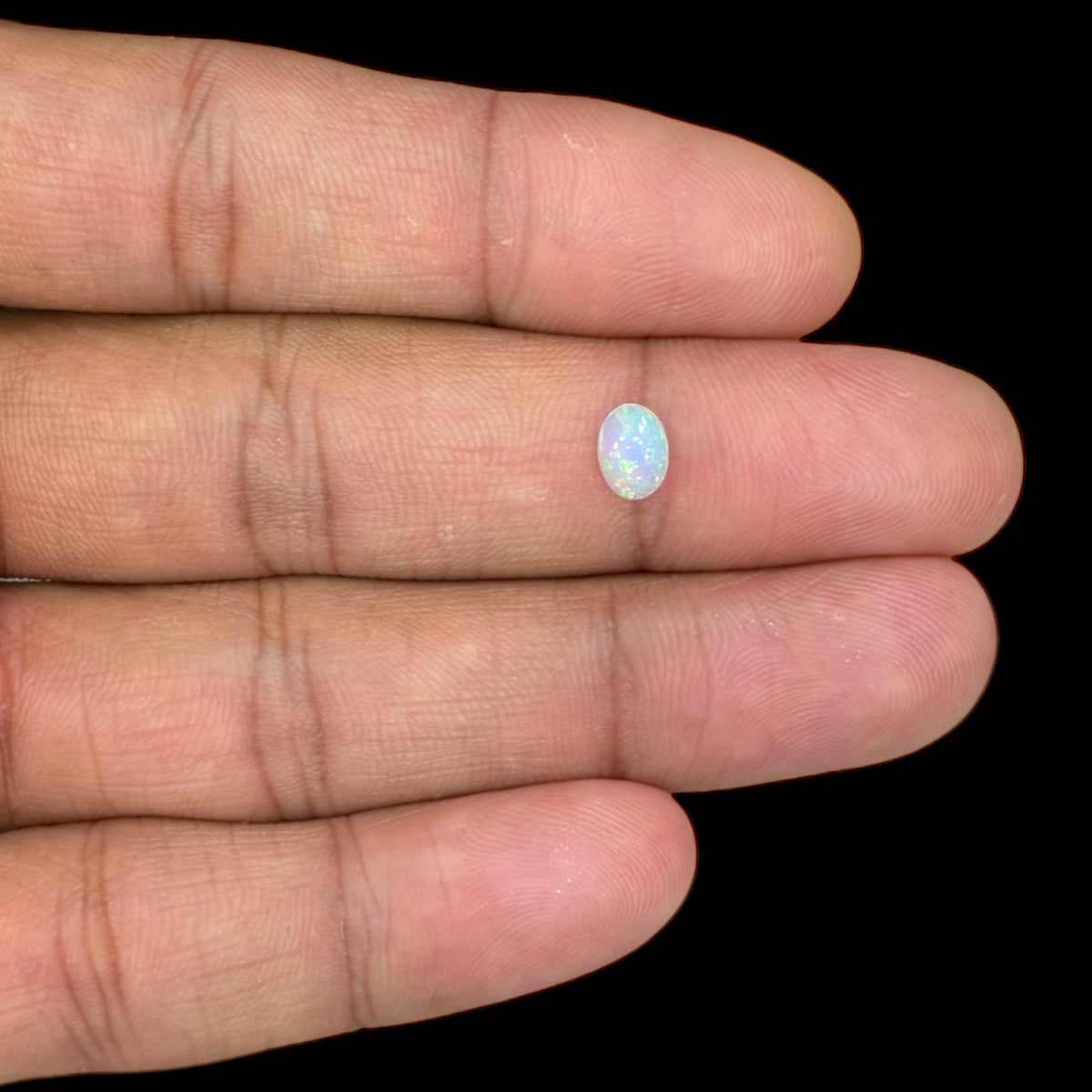 Natural White Ethiopian Opal Stone 0.36 Carats Oval Cabochon Shape 6.8 x 5 mm