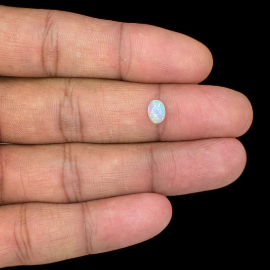 Natural White Ethiopian Opal Stone 0.36 Carats Oval Cabochon Shape 6.8 x 5 mm
