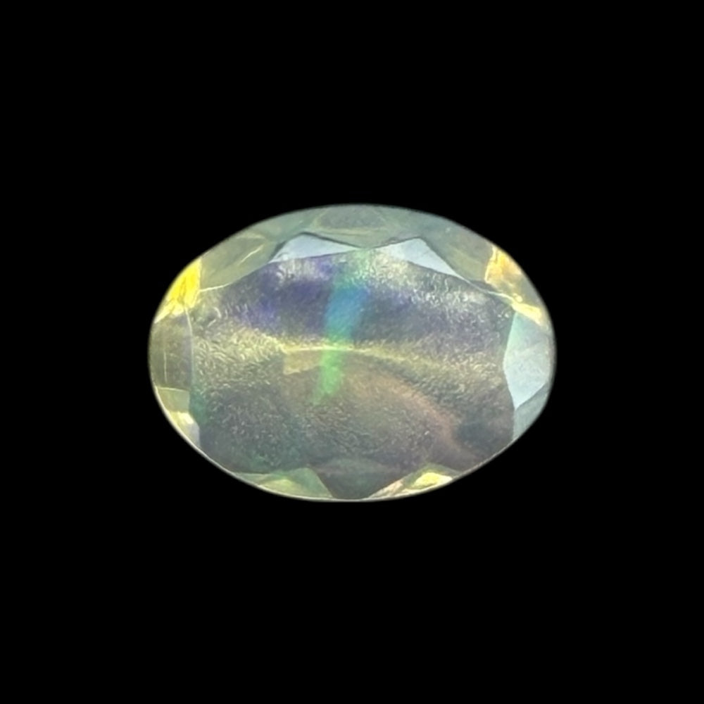 Natural White Ethiopian Opal Stone 0.36 Carats Oval Cabochon Shape 6.9 x 5 mm