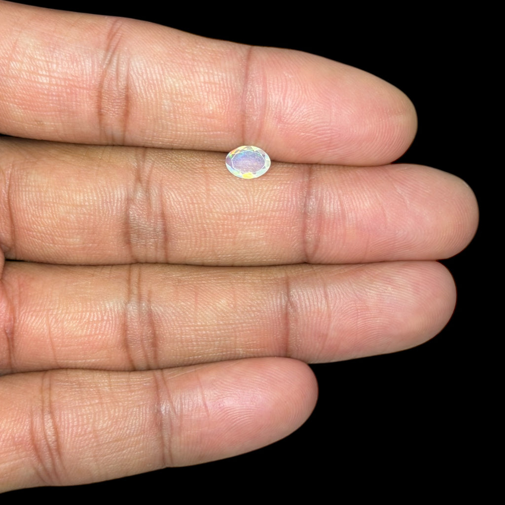 Natural White Ethiopian Opal Stone 0.36 Carats Oval Cabochon Shape 6.9 x 5 mm