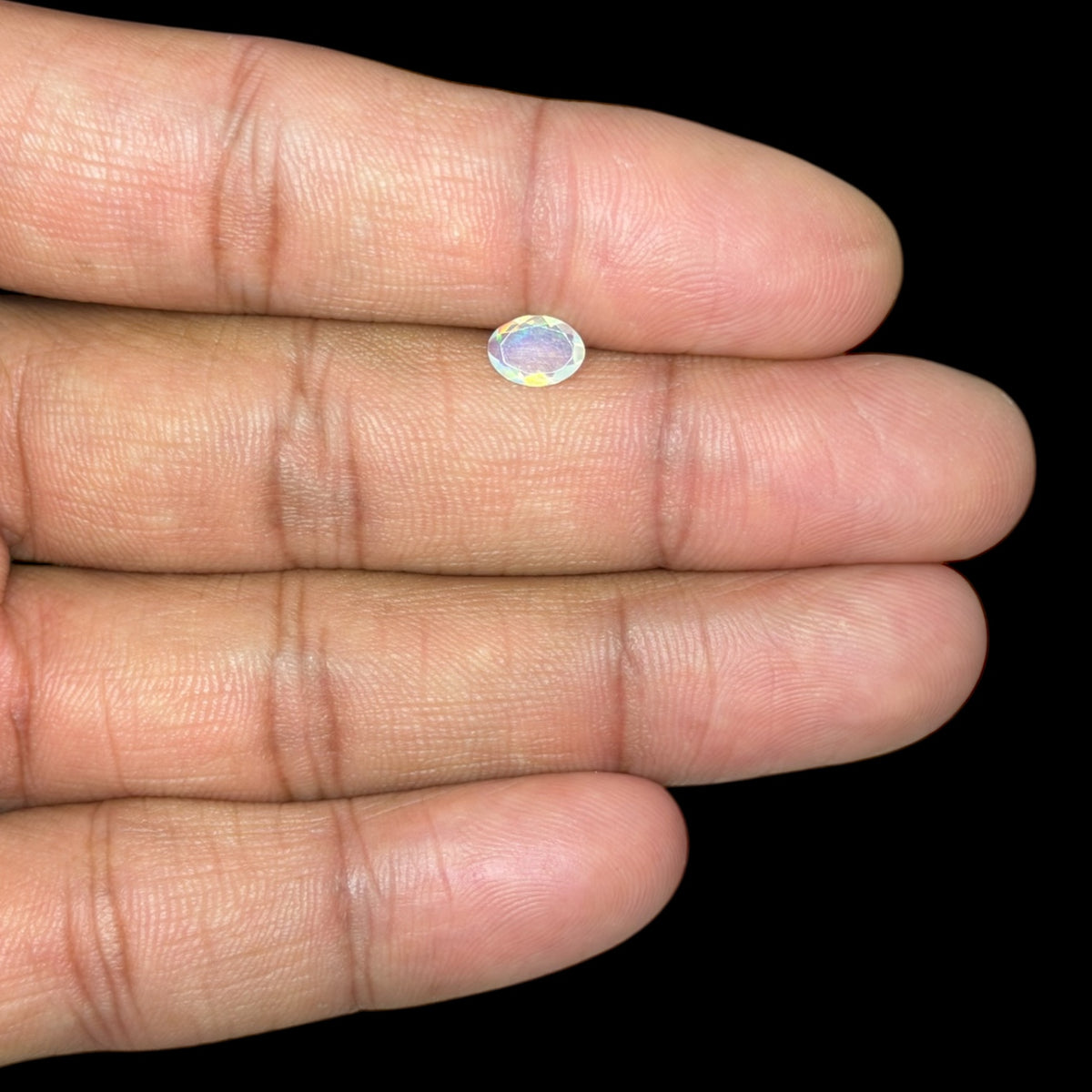 Natural White Ethiopian Opal Stone 0.36 Carats Oval Cabochon Shape 6.9 x 5 mm