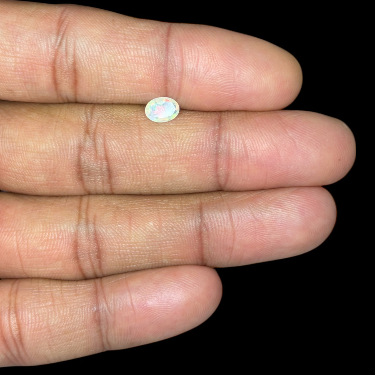 Natural White Ethiopian Opal Stone 0.37 Carats Oval Cabochon Shape 6.8 x 5 mm