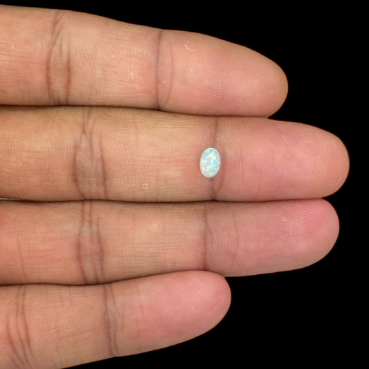 Natural White Ethiopian Opal Stone 0.43 Carats Oval Cabochon Shape 6.1 x 4.2 mm