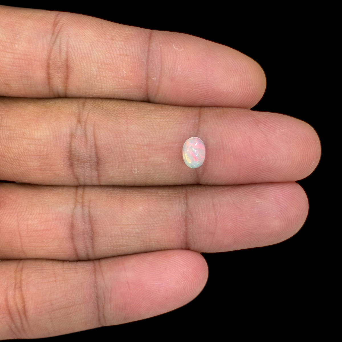 Natural White Ethiopian Opal Stone 0.58 Carats Oval Cabochon Shape 7 x 5 mm