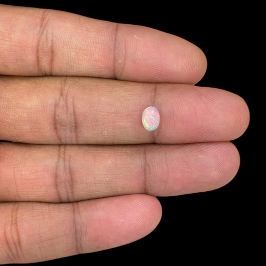 Natural White Ethiopian Opal Stone 0.58 Carats Oval Cabochon Shape 7 x 5 mm