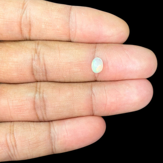 Natural White Ethiopian Opal Stone 0.65 Carats Oval Cabochon Shape 7 x 5.2 mm