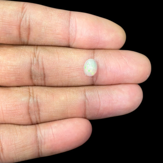 Natural White Ethiopian Opal Stone 0.67 Carats Oval Cabochon Shape 8.2 x 6.2 x 3.2 mm