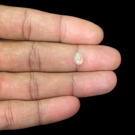 Natural White Ethiopian Opal Stone 0.78 Carats Oval Cabochon Shape 7.9 x 6 x 3.3 mm